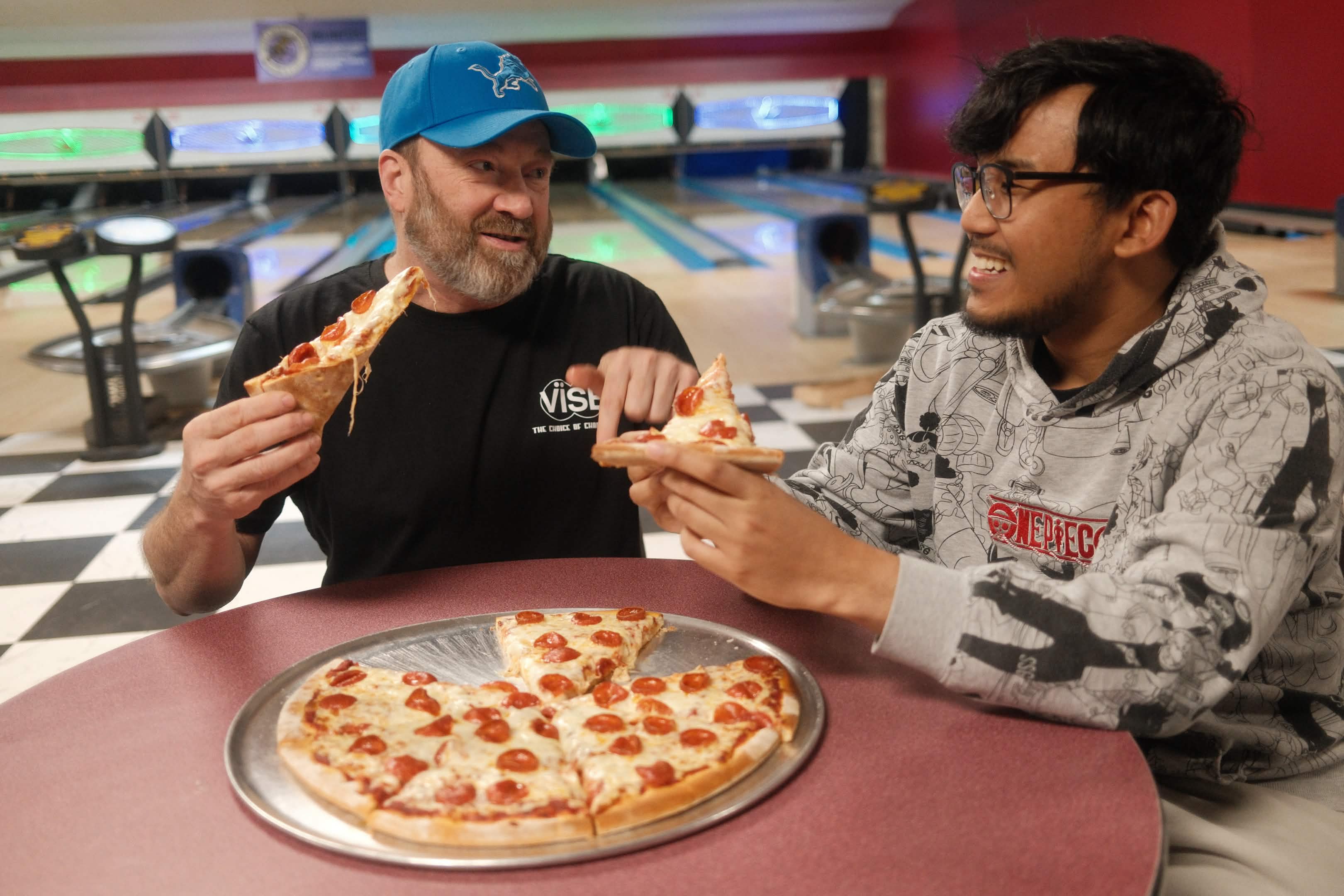 People Eating Pizza